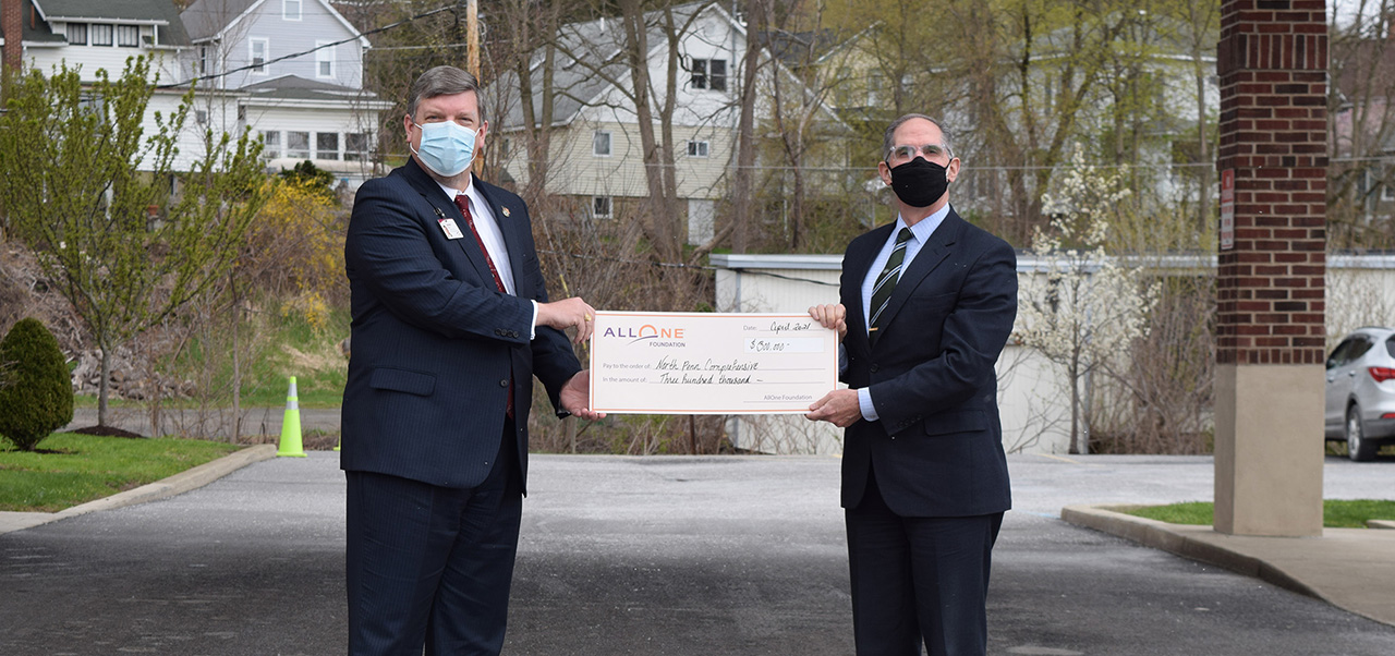 LHC President Jim Nobles Accepts Check Donation from AllOne Foundation