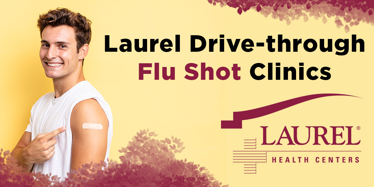 A Smiling Young Man Points to a Band-Aid on His Arm Where He Received His Flu Shot; Laurel Health Hosts Drive-Through Flu Shot Clinics All October
