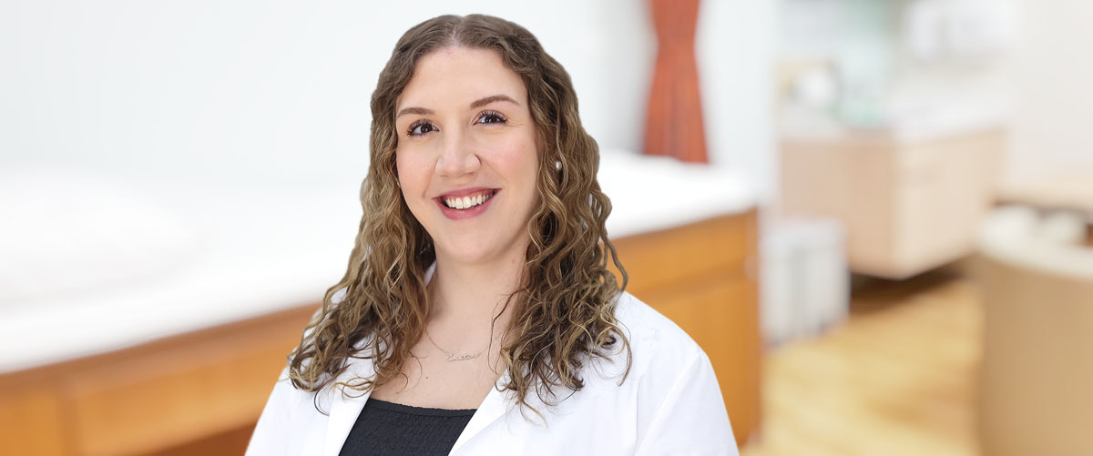 Photo of Katie Lutz, PA-C, in an exam room; Katie is a certified physician assistant at Mansfield Laurel Health Center, located at 416 South Main St. in Mansfield, PA