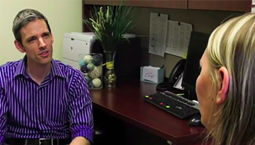 Mental health provider in a therapy session with a patient.